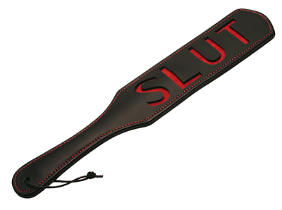  The compact size of this severe spanking paddle belies the amount of punishment in store for any filthy subject naughty enough to earn its sting. Put them in their place and let them know what you really think of them- the word SLUT is emblazoned on the front in deep red suede. The paddle has a firm, inflexible core sewn between two pieces of black leather with red thread. Do some serious damage to both their hide and their pride with this premium spanking paddle.

Measurements: 14.5 inches in length, 2.5 inches wide and 0.25 inches thick

Material: Leather and suede

Color: Black and red
